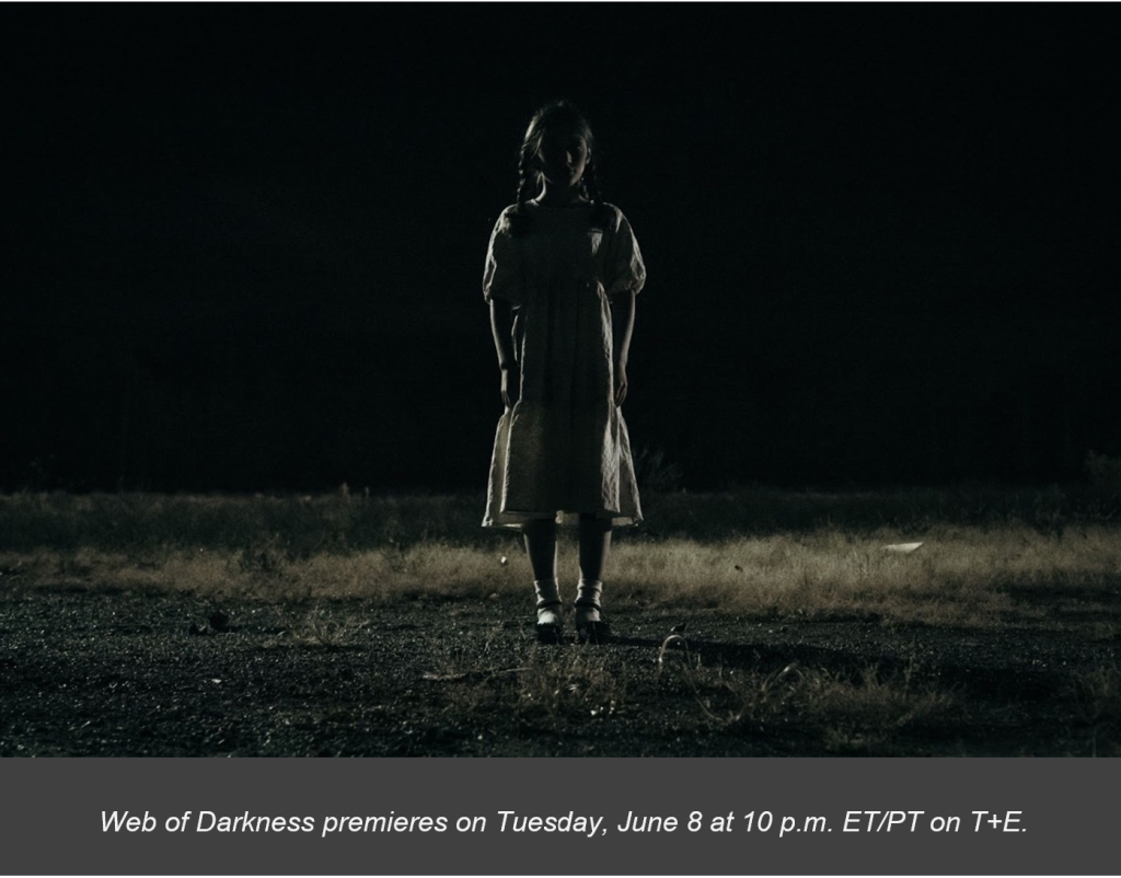 Web of Darkness promo with a girl in an old-fashioned dress standing alone in the middle of a dark field