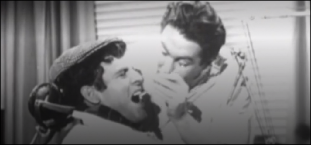 A screenshot of the dentist and Seymour from The Little Shop of Horrors (1960)