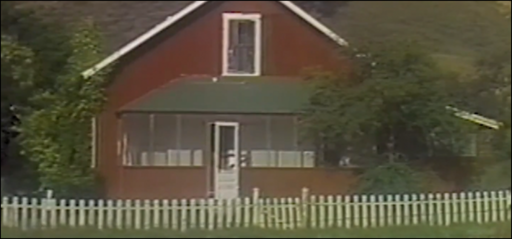 Still from the movie Sledgehammer depicting a house