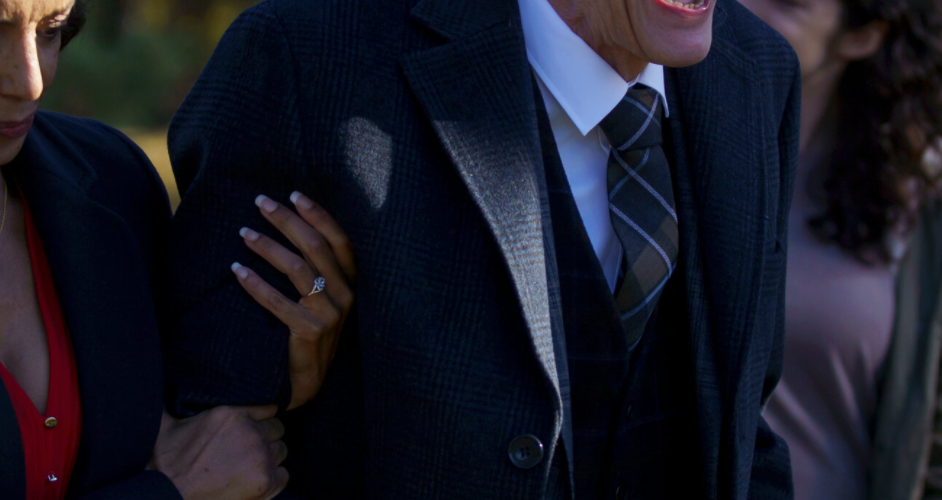 older man in suit screaming as he is held by the arm by a younger woman - shudder's Slasher S4E1