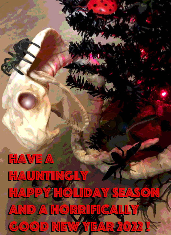 Happy Holidays card with close up of glowing eyed skeleton snake and message
