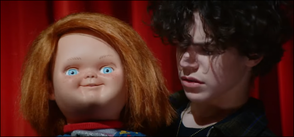 Chucky S1 E1 - "Death By Misadventure" screencap depicting Chucky and Jake