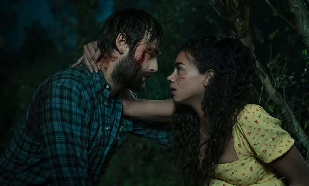 Unwelcome (2022) still from Well Go USA depicting actors Douglas Booth and Hannah John-Kamen