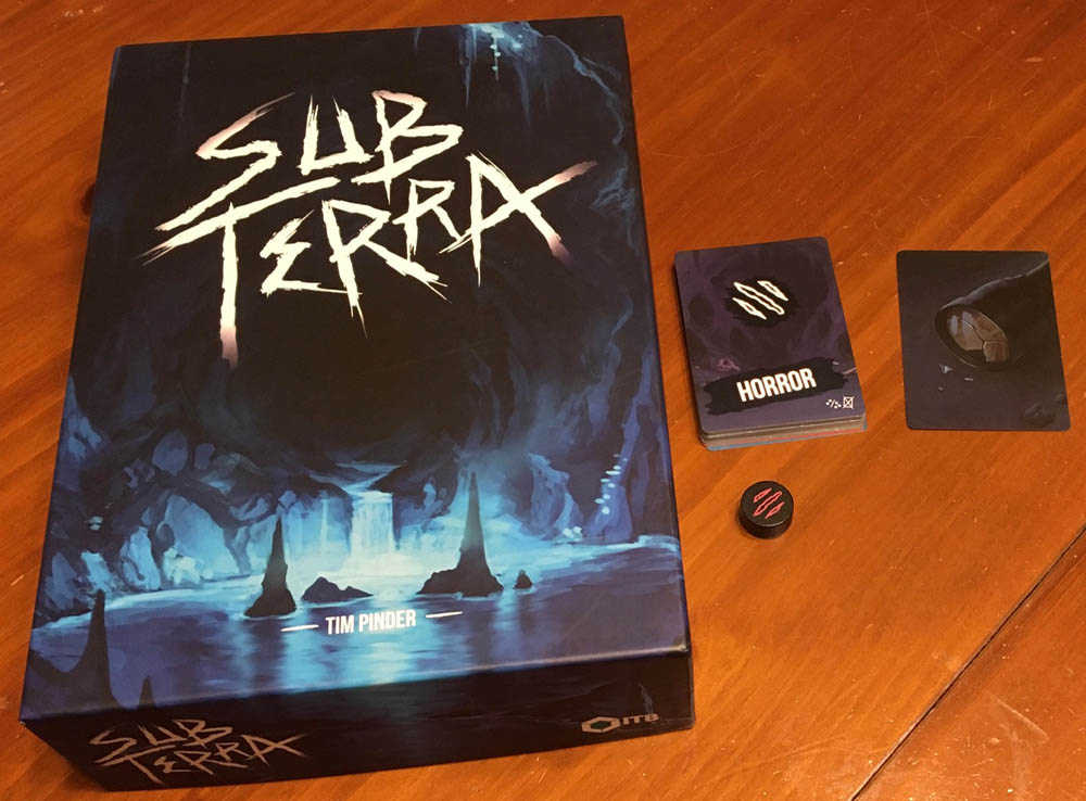 Sub Terra box, selected cards, and horror token
