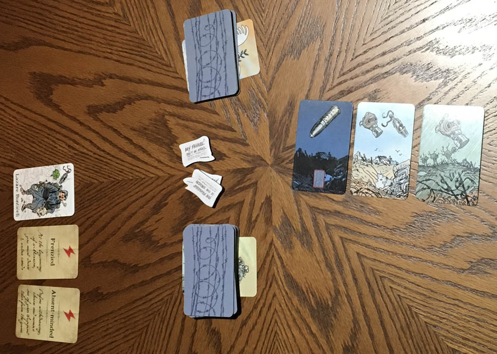 Another player to the left of the Armistice and Memorial decks and current mission in play with speeches to be distributed in the middle 