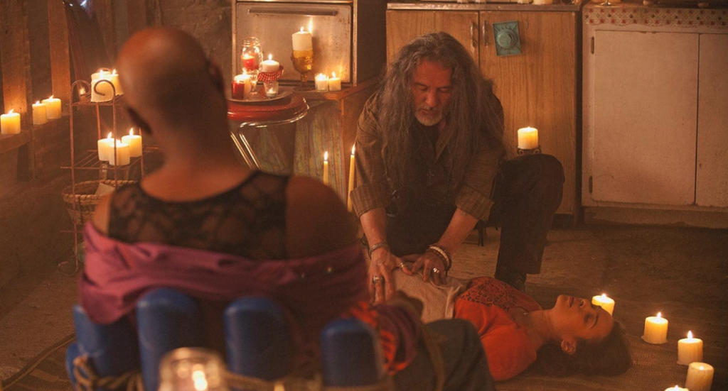 TrueBlood S5E7 Lafayette at Jesus' family home tied up as he performs a ritual