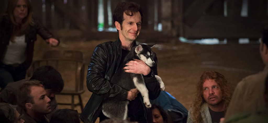 Trueblood S5E9 Russell holding Emma as a pup