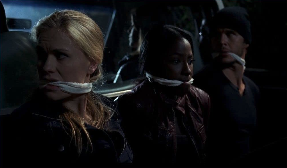 Trueblood S5E12 Sookie, Tara, and Jason tied up in the back of the truck