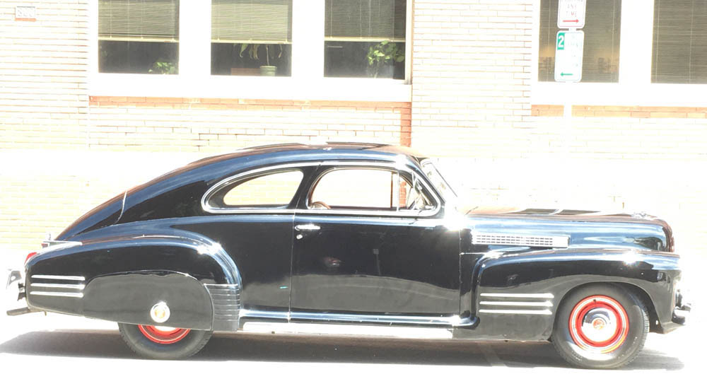 a beautifully maintained/restored vintage automobile as seen in Wichita KS, which makes for a great unassuming UFO in our alien encounter