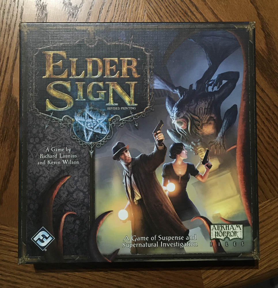 game box featuring two investigators and a monster