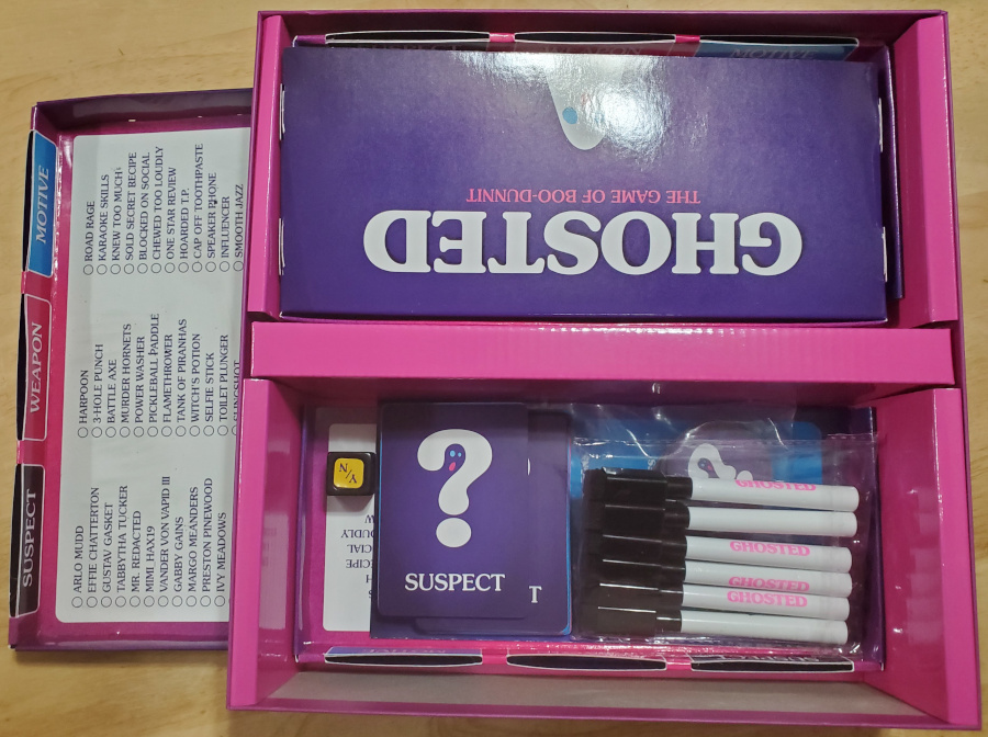 The Ghosted game components in the box