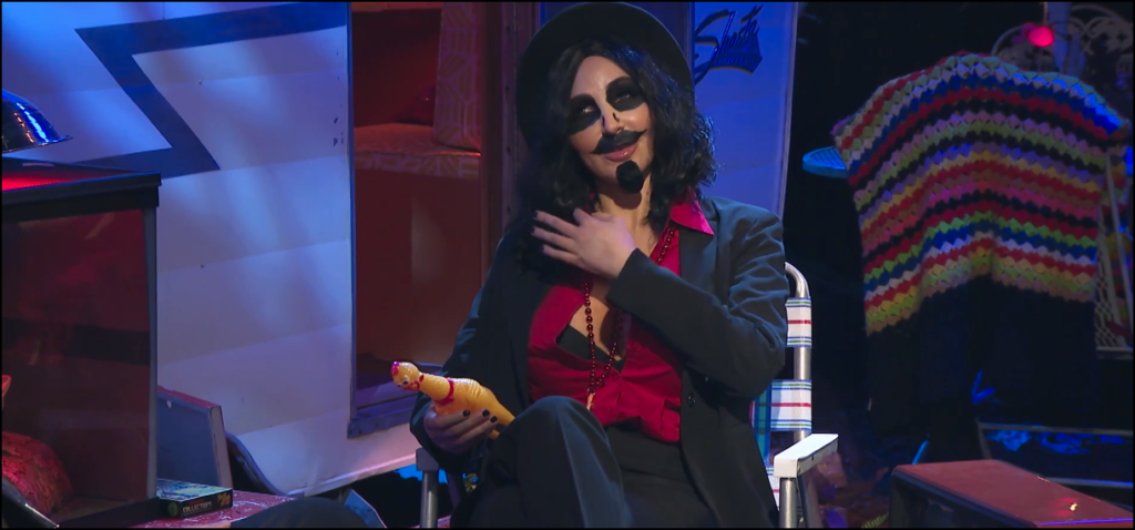 Still from The Last Drive-In with Joe Bob Briggs featuring Darcy as Svengoolie