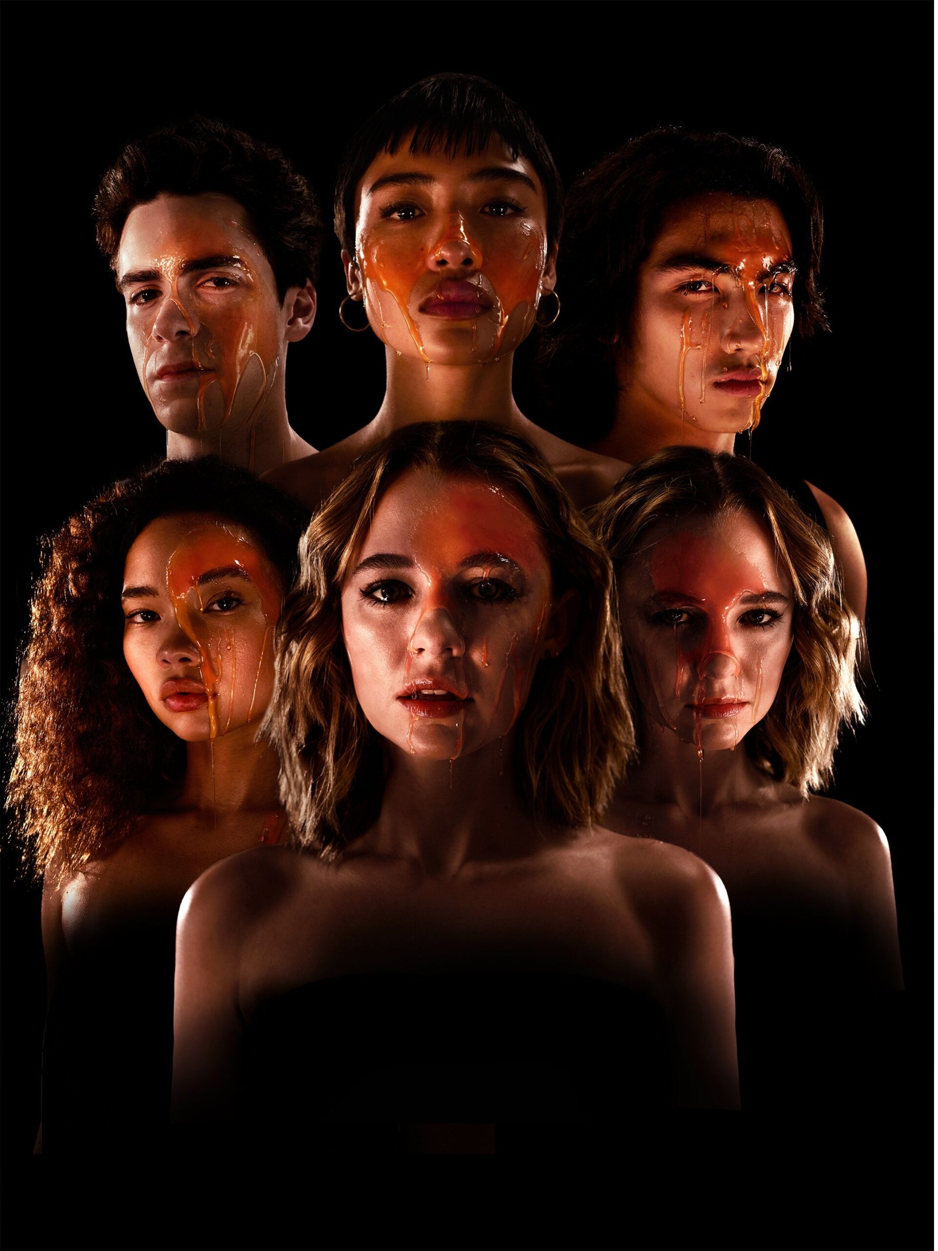 Six teenagers, four girls and two guys are looking directly at the camera. There is blood on their faces. The background is black.