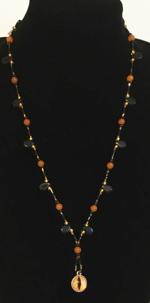 Eye Candy Necklace by Jennifer Weigel with orange gold Evil Eye