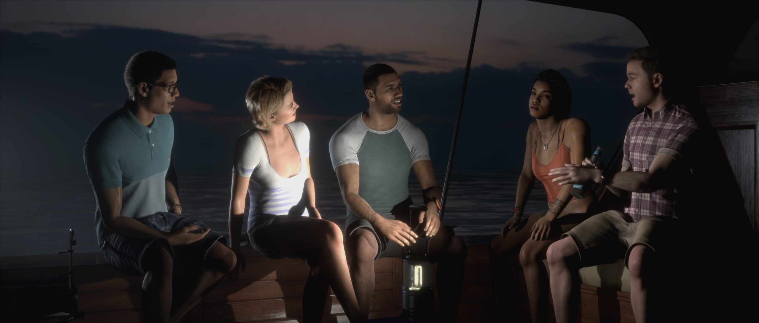 Five main characters sit in the dark lit up by only a lantern. From left to right - Brad, Julia, Alex, Fliss and Conrad. They look mid conversation