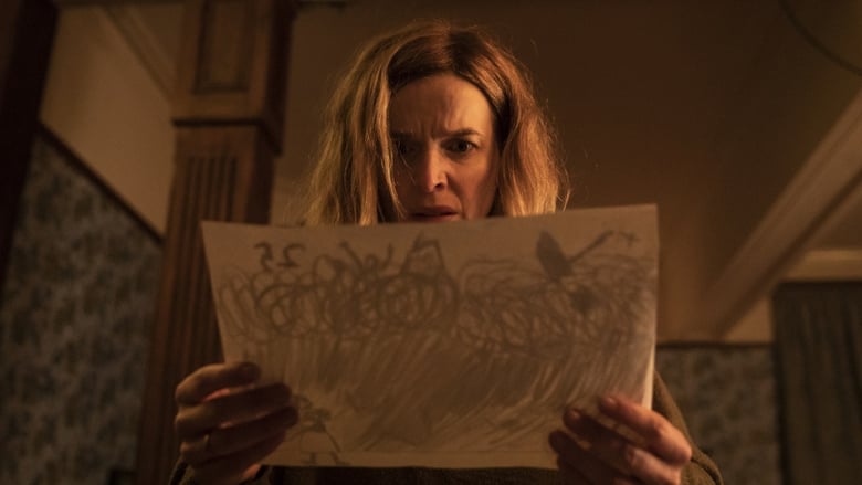Thekla Reuten as Dr. Marianne Winter looking at Manny's drawing