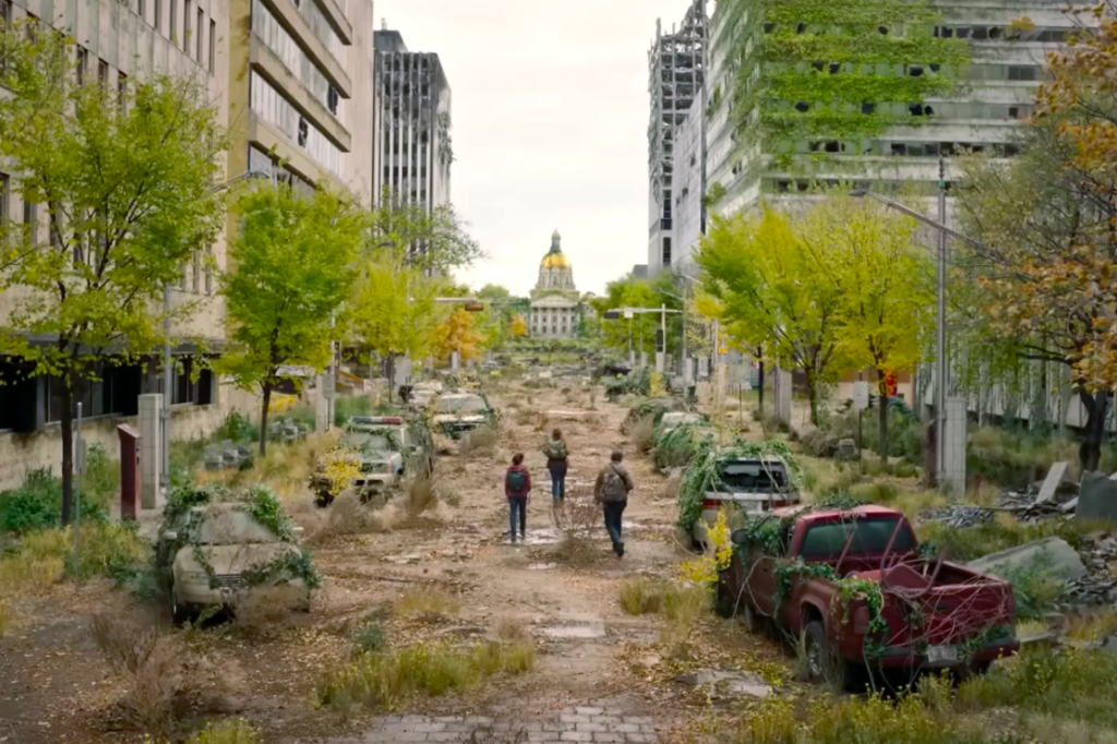 Ellie, Joel and Tess walk to the capitol building 