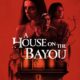 Red background, the leading cast at the top, upside down is the house on the bayou