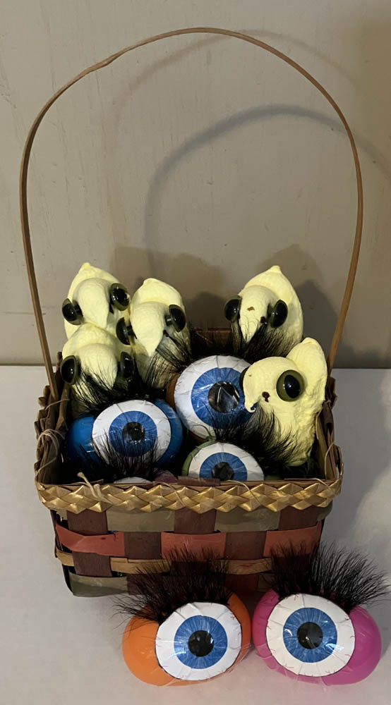 Peeps Easter basket with eye candy marshmallow chicks and eye plastic eggs with luxurious lashes