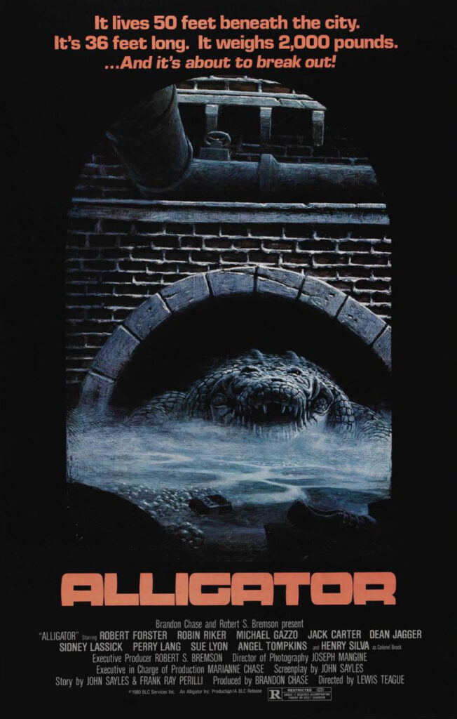 A movie poster for Alligator. It shows an alligator in a sewer system. It reads "It lives 50 feet beneath the city. It's 36 feet long. It weighs 2,000 pounds.  .... And it's about to break out!"