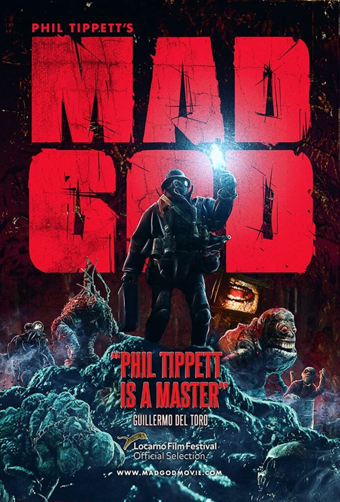 A poster for Phil Tippett's Mad God. It shows a nightmarish scene of monsters.
