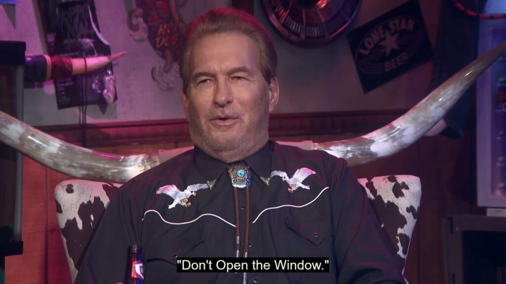 Joe Bob sits in his longhorn chair and lists off alternate titles to Manchester. The caption on the image reads "Don't Open the Window."