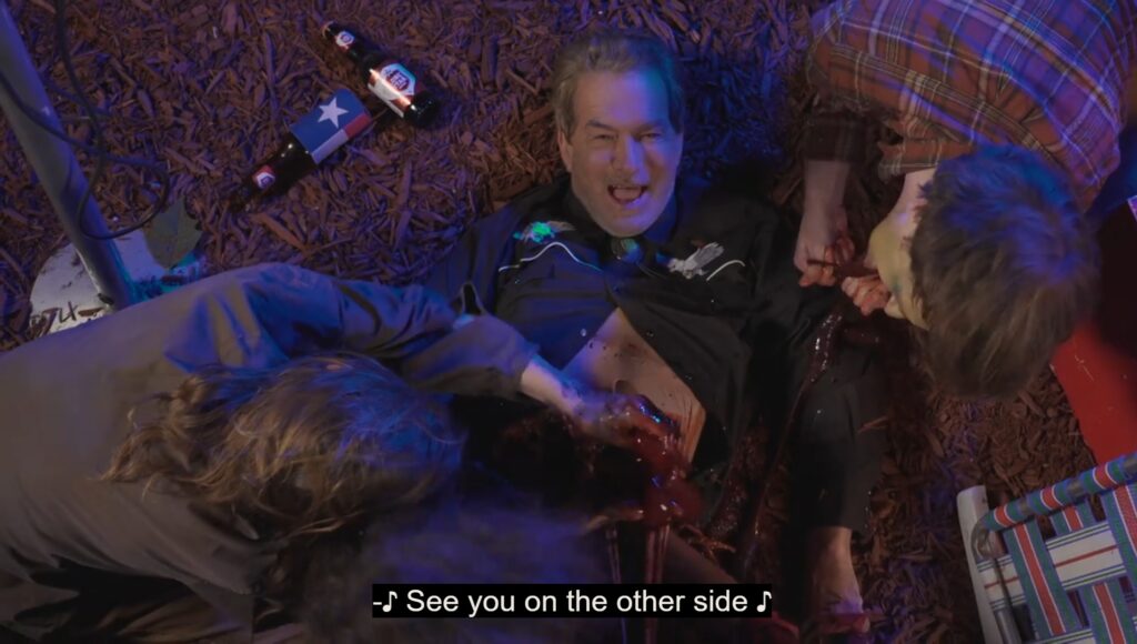 Zombies feast on Joe Bob's guts as he sings "See you on the other side."