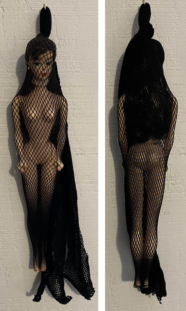 Retro Barbie doll in fishnet pantyhose, wall hanging