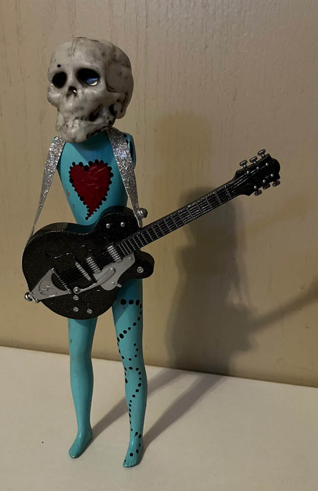 Custom found doll body with skull head and electric guitar