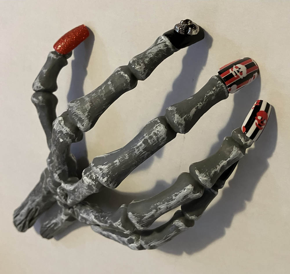 Pirate skeleton hand with faux fingernails