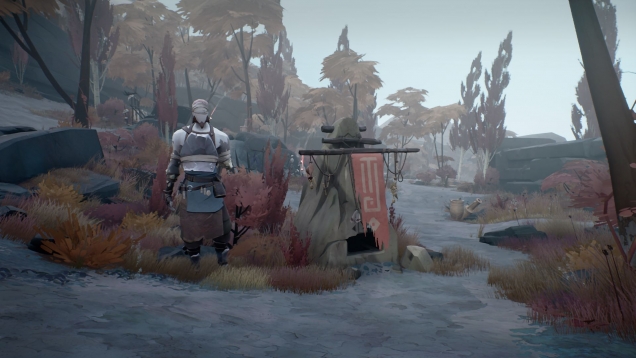 The beginnings of a small village. A man waits by a pillar, facing the player.