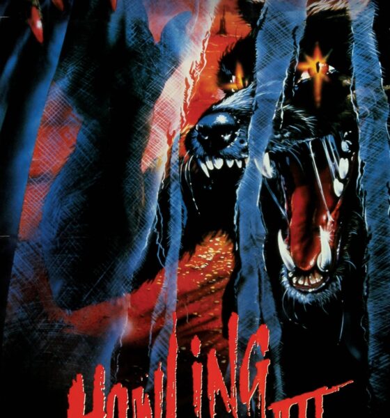 A long snouted creature rips through a white screen. The title "Howling III" written in red underneath.