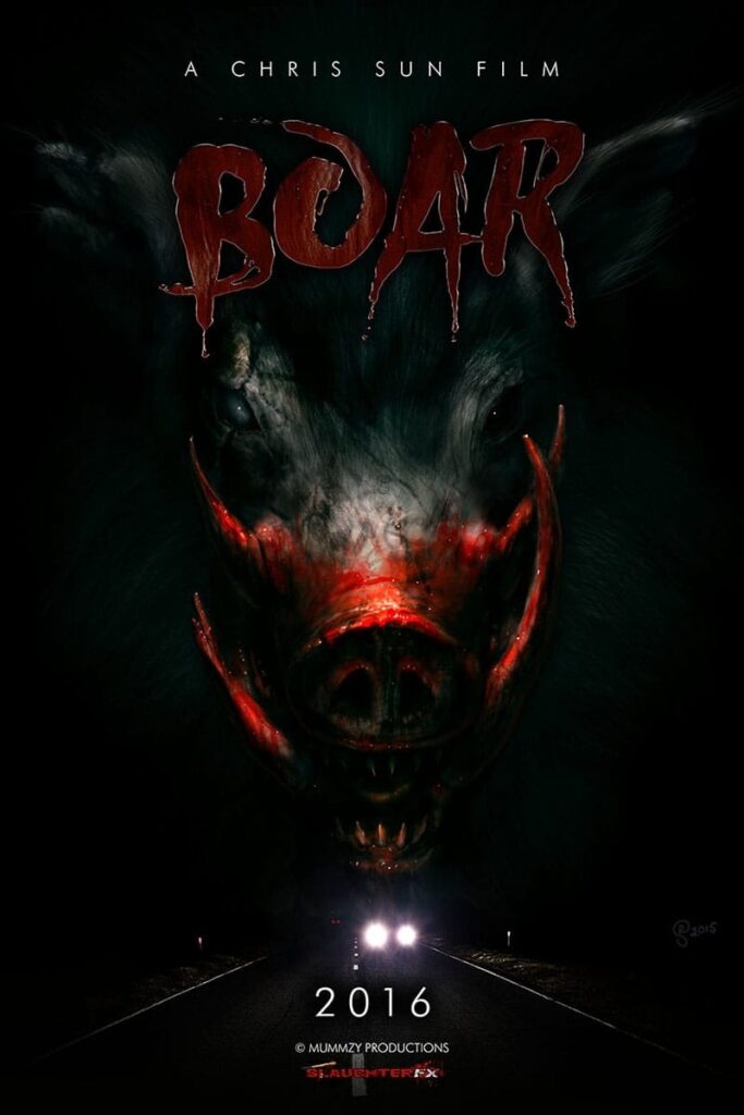 A creature with large tusks emerges from a darkness. Above its head reads Boar.