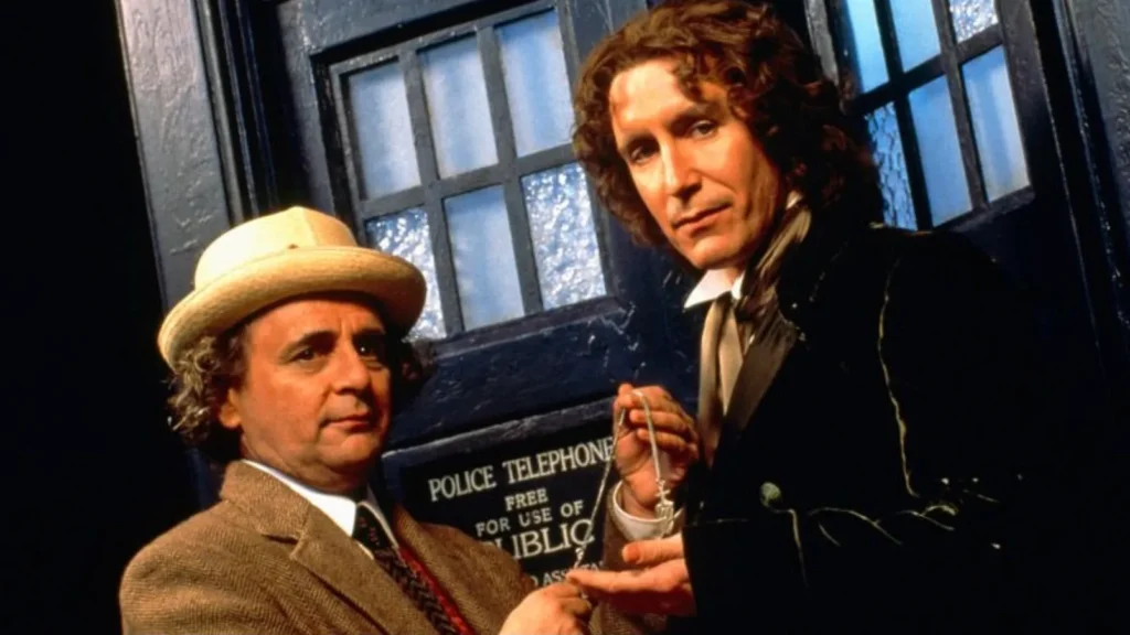 Sylvester McCoy passing the key to the new Doctor