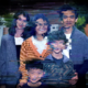 family with blurred faces