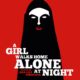 A red background reveals a woman in black. Her face is white and lips are red. The title reads "A Girl Walks Home Alone At Night"