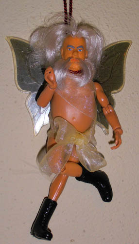 Nude Santa doll with big bow tied around waist and silver fairy angel wings Happy New Years Baby!