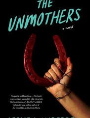 The Unmothers book cover. A hand holding up a horse shoe covered in blood on a black background.