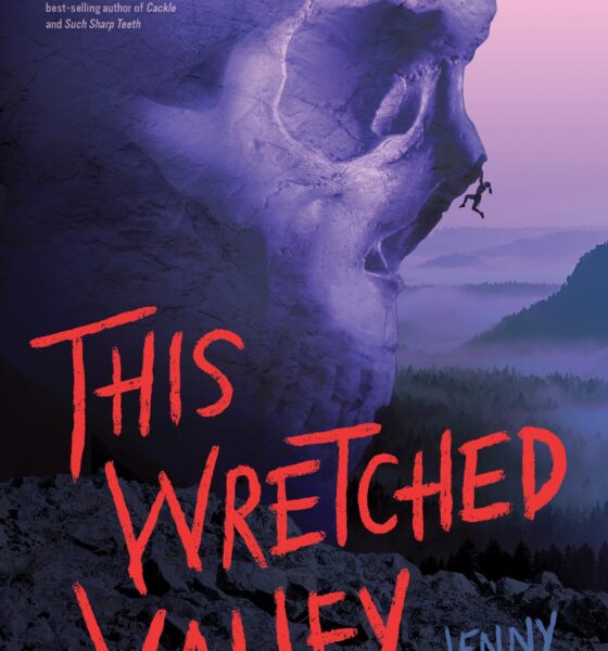 This Wretched Valley book cover. Purple cliff shed like a skull with climber hanging