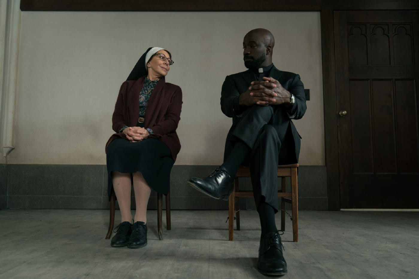 Sister Andrea and Father David Acosta prepare her defense