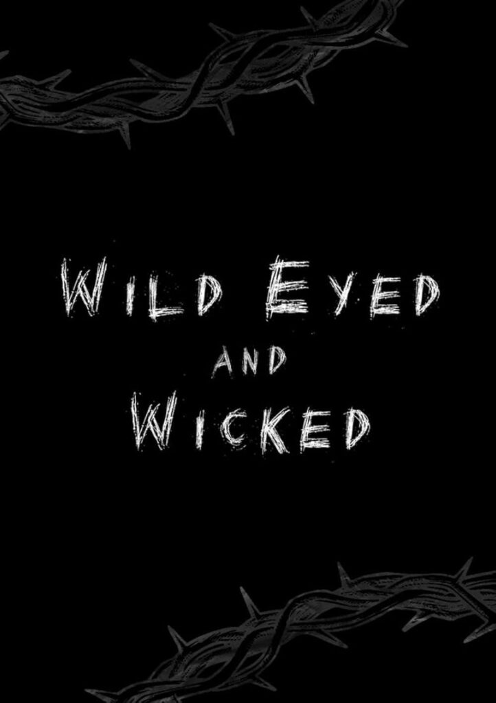 A black background reveals thorny vines. In the center reads "Wild Eyed and Wicked."